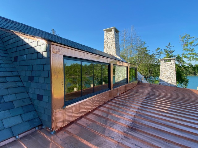 Copper roof sections with graduated natural slate at Lake Keowee, South Carolina
