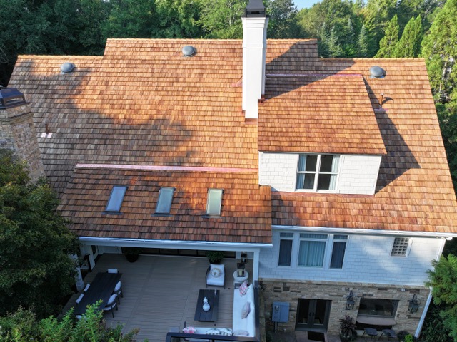 Heavy hand-split cedar shakes on a Roswell, Georgia residence